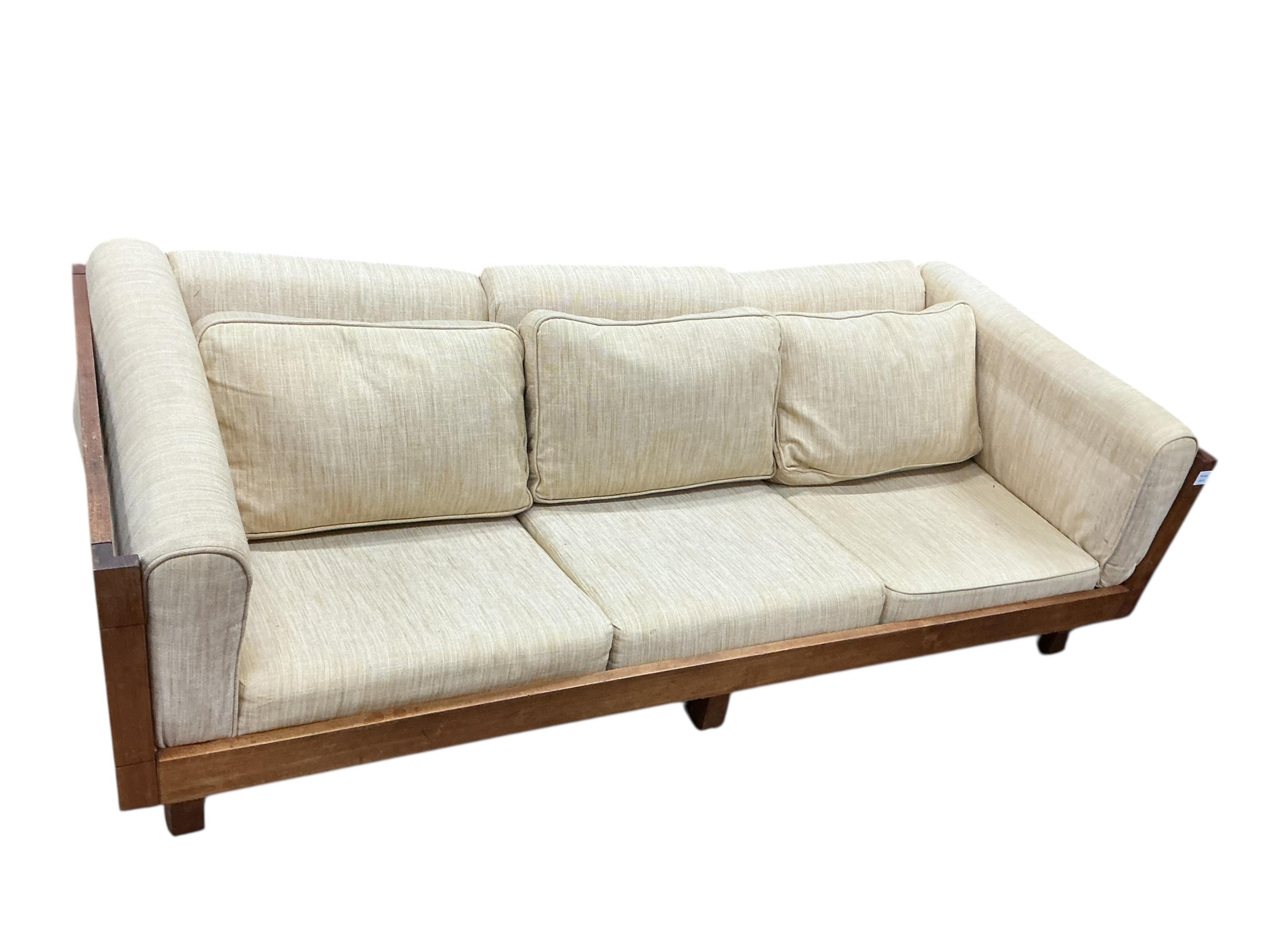 A mid century teak Bastiano style three seater settee, width 199cm, depth 86cm, height 84cm